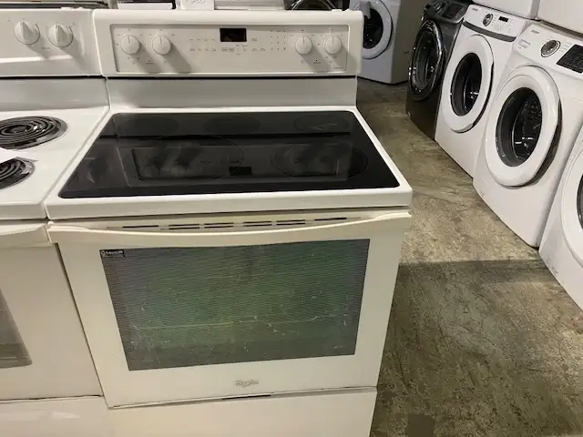 Cuisinière blanche vitrocéramique convection Whirlpool