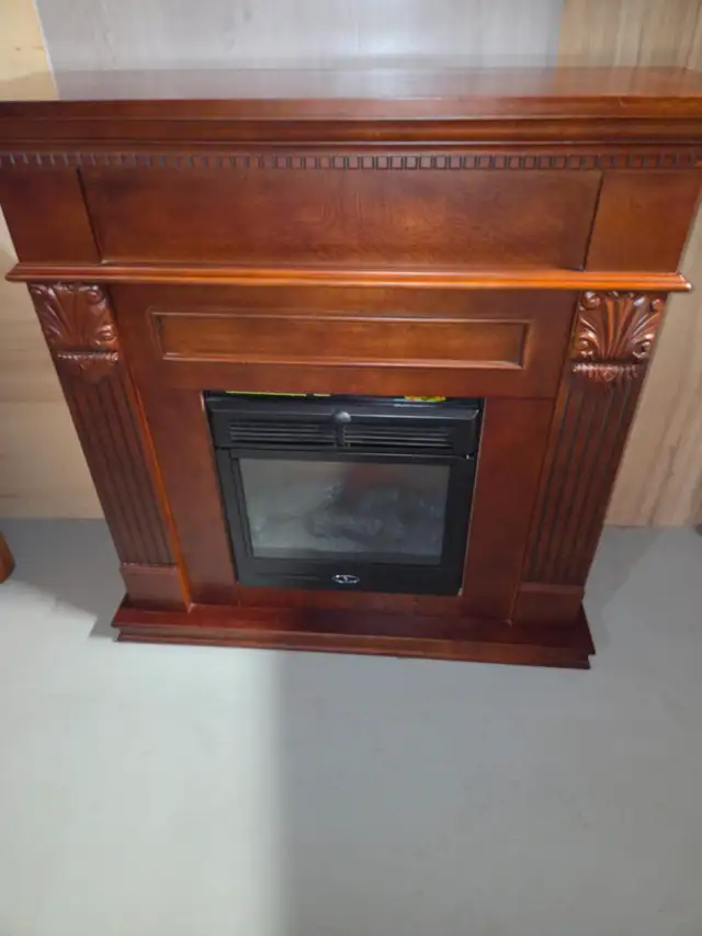 FREESTANDING ELECTRIC MAHOGANY FIRE PLACE