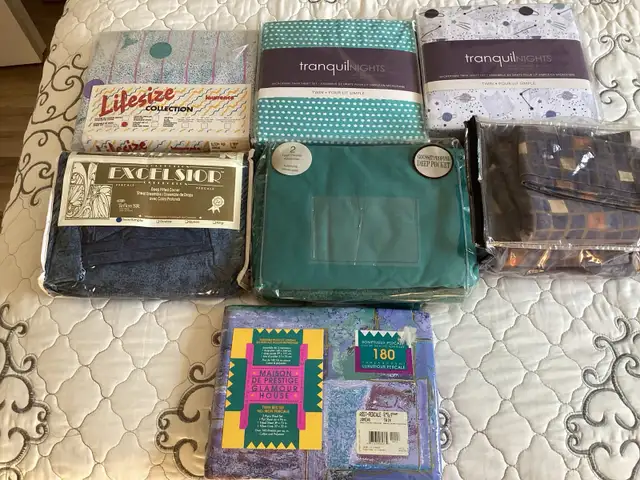 drap lit simple neuf $25.00 chaque