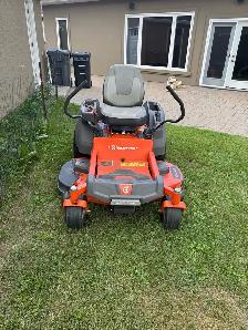 Husqvarna Zero Turn Lawn Tractor with Mulch Kit - Photo 4