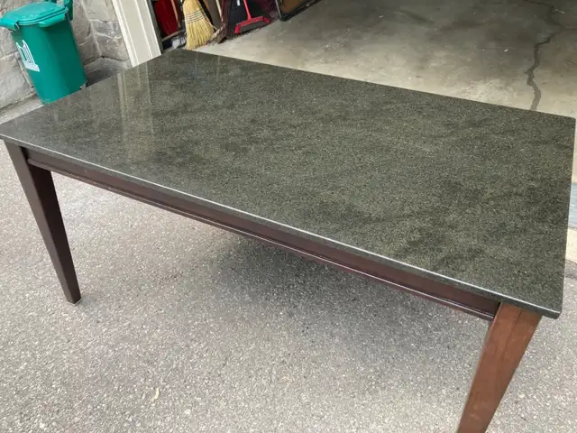 Uba Tuba Granite Dining Table with Ikea Leather Chairs