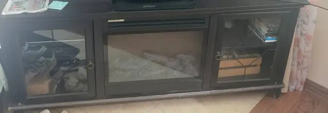 dark chocolate large features a built-in electric fireplace