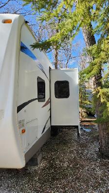 RV CAMPER ON SEASONAL LOT - Photo 2