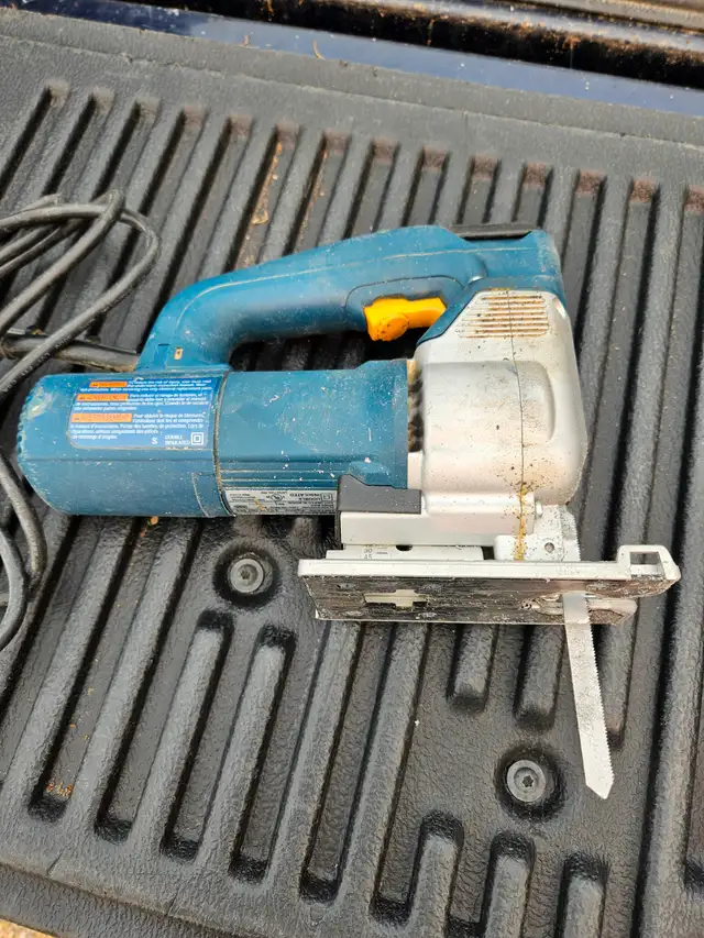 Bosch Jig Saw, variable speed, works great. $ 50