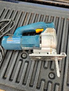 Bosch Jig Saw, variable speed, works great. $ 50