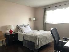 Fully Furnished 3-Bedroom Main Floor in Varsity | Double Garage - Photo 4