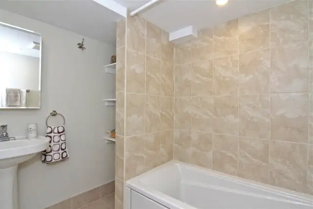 Junction-area gem with utilities   ensuite laundry included!