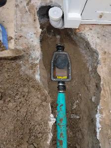 ROUGH IN WASHROOM DRAIN SNAKE WATERPROOFING WET BASEMENT FLOOR