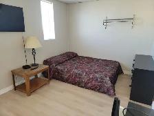 Furnished Large bachelor- all utilities included-pet friendly