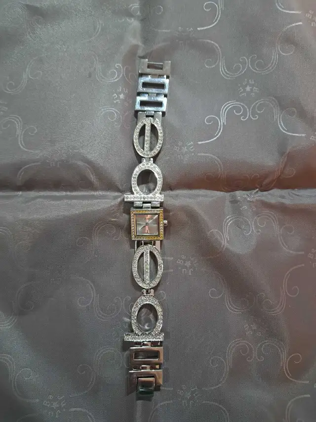 Bebe Women's Rhinestone Bracelet Watch