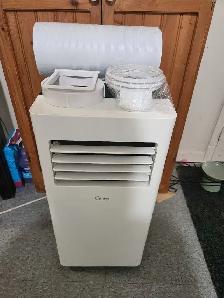MIDEA 8000 BTU 4 IN 1 AC,DEHUMIDIFIER, HEATER, HOSE