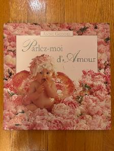 LIVRE DE PHOTOS DE BÉBÉS (ANNE GEDDES) COMME UN NEUF!