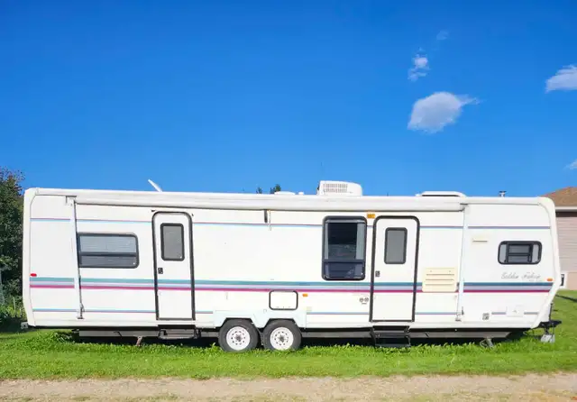33' Golden Falcon Travel Trailer - 2 Slide Outs