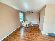 Clean & bright main floor furnished private BRs for rent in SE - Photo 2