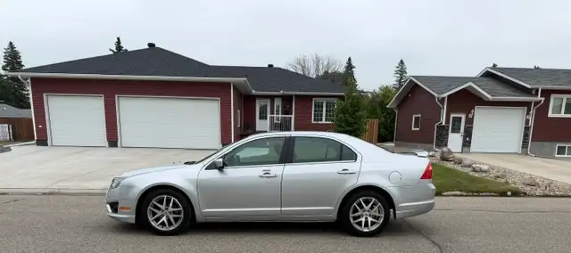 2010 FORD FUSION SEL PKG..... FWD PKG