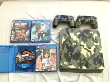 Sony PlayStation 4 1TB with 2 controllers, 15 games