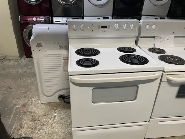 Cuisinière blanche ronds serpentins Moffat
