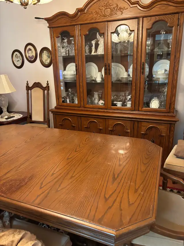 Dining table with six chairs and two arms chair