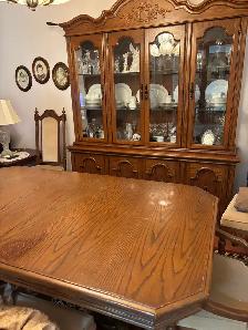Dining table with six chairs and two arms chair