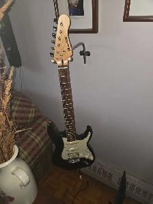vente ou échange guitare électrique .