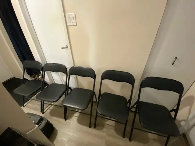 For Sale 5 black folding chairs