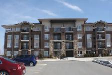 Spacious 2 Bedroom   Den Condo – Top Floor