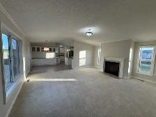 2005 mobile home for sale in Blackfalds with double car garage - Photo 2