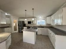 2005 mobile home for sale in Blackfalds with double car garage - Photo 4