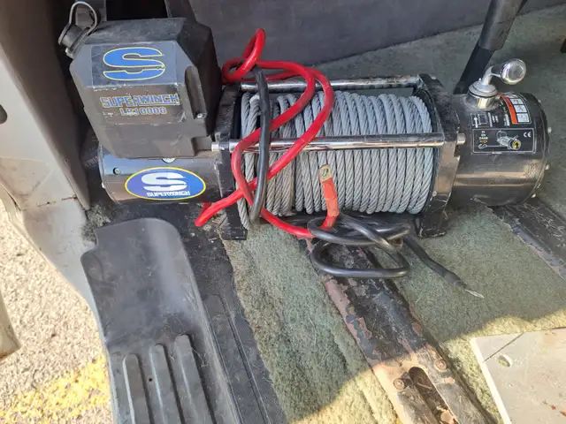 10,000 pound  Superwinch with hitch mount.