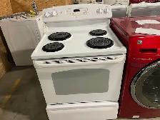 Cuisinière blanche ronds serpentins GE