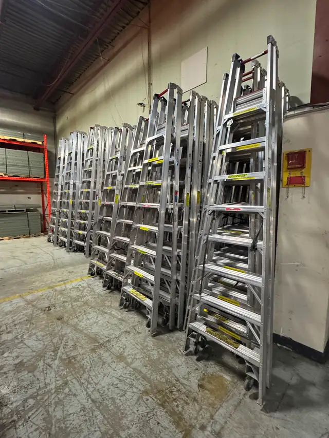 Used aluminum step ladders 8’ to 12’