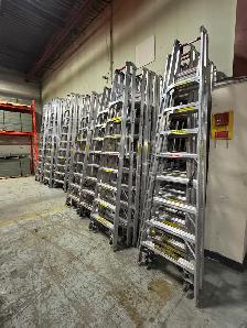 Used aluminum step ladders 8’ to 12’