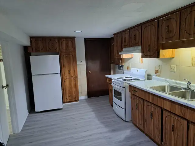 Monthly Rent $1,850:.2 Bed rooms 1 bath room at House Basement