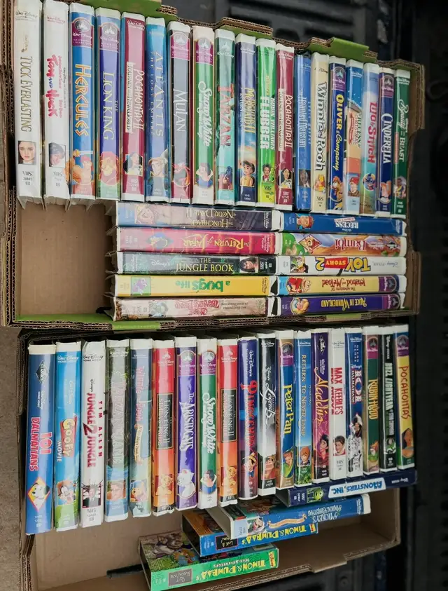 I HAVE 52 WALT DISNEY VHS MOVIES FOR SALEAS PICTURED