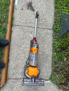 DYSON upright vacuum c/w accessories (works well)AS PICTURED