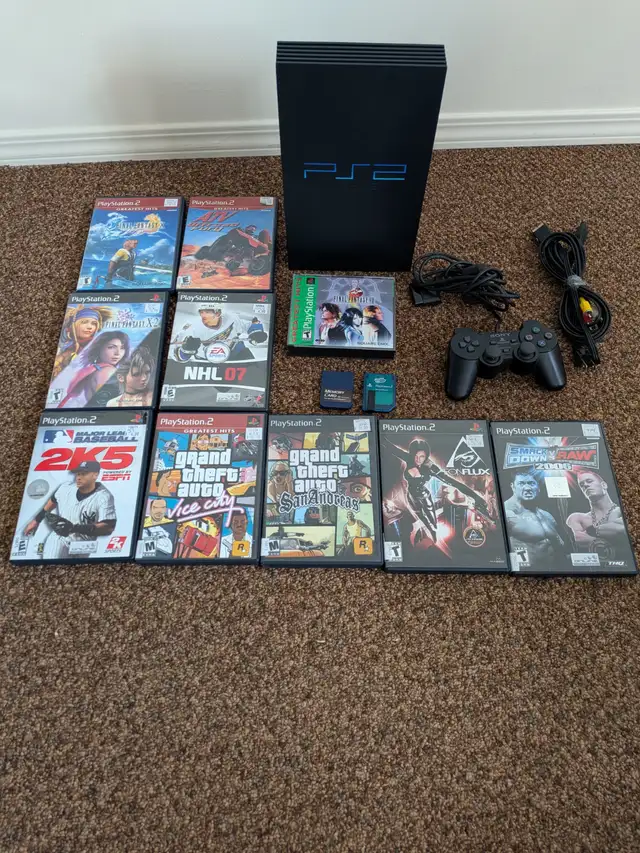 PLAYSTATION 2 controller 10 games & 2 memory cards $125
