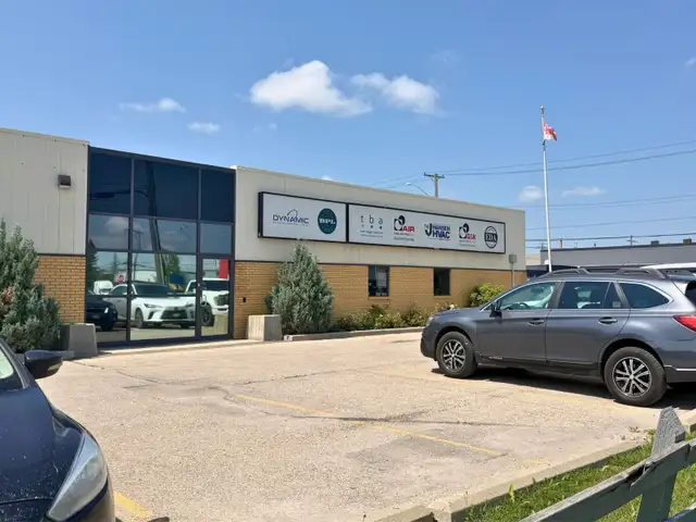FOR SALE— #2116 Logan Avenue, Winnipeg Corner Office/Warehouse