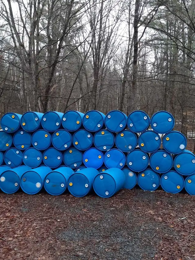 PLASTIC BLUE 45 GALLON BARRELS