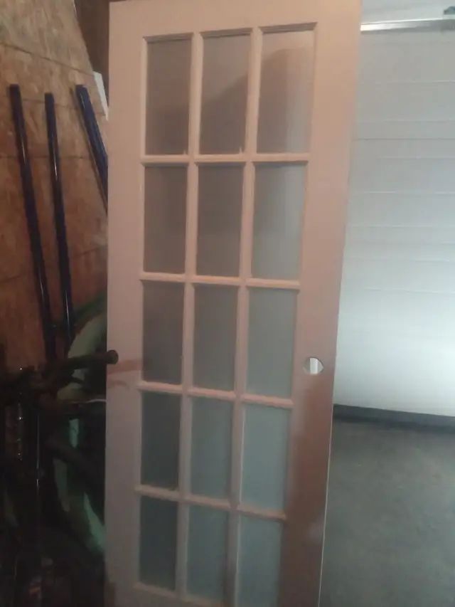 Interior door with glass