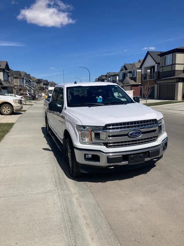 Mover- 5.5’ bed pickup truck with helper