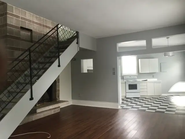 2 LEVEL 1.5 br apt. Very large with 20’ stone fireplace. locatio