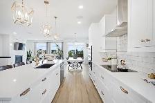 Stunning 4bdrm Bungalow w/Triple Att Garage on a Prime Lake Lot! - Photo 4