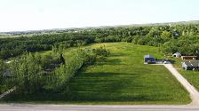Rare chance to own a 3.6 acre riverfront lot in Lorette!