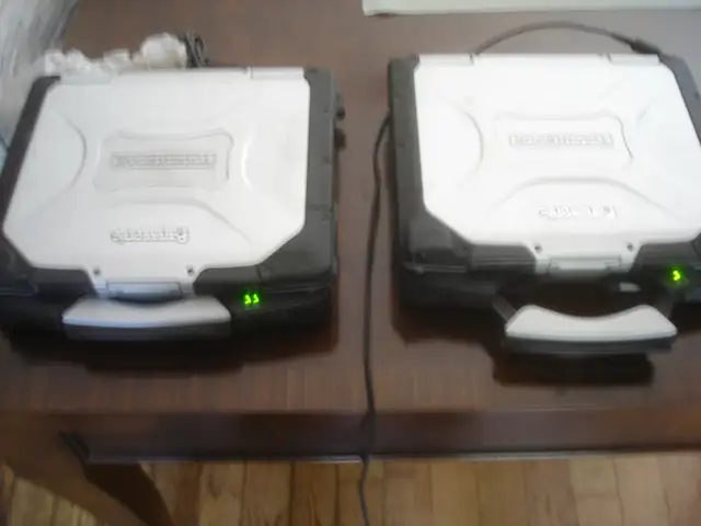 Two Panasonic CF30 Toughbooks laptops