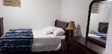 Fully Furnished 2-Bedroom Basement Suite – Private Bathrooms - Photo 8