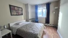 Room for Rent 2 bedroom High Rise condo is in a Prime Location D