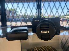 Canon EOS M100 24.2MP with 15-45mm F3.5-6.3 lens and charger