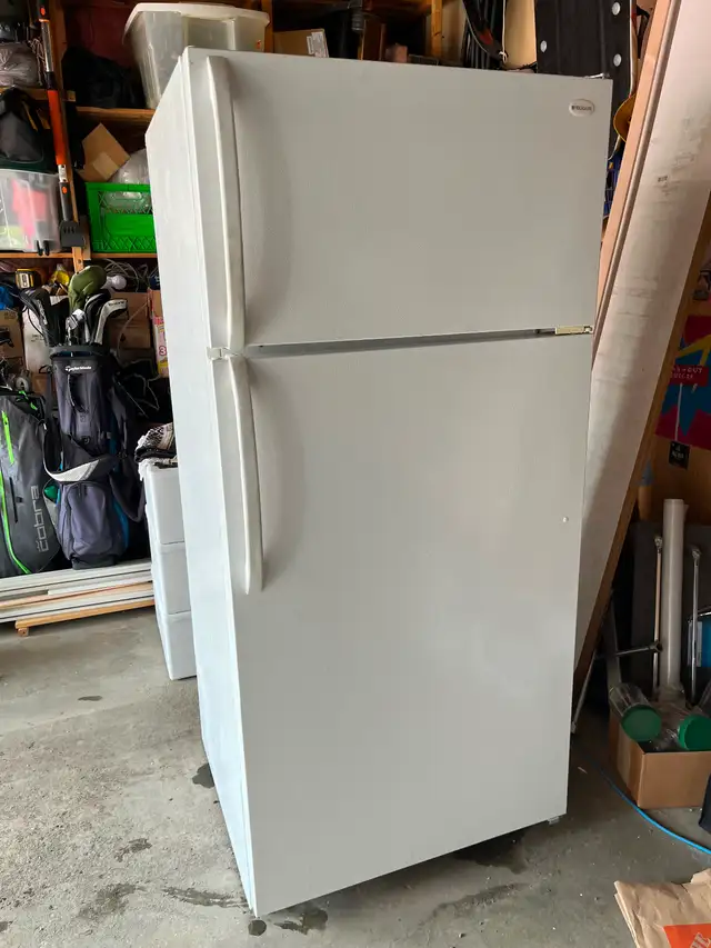 Free Frigidaire refrigerator.