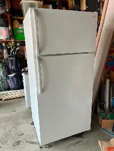 Free Frigidaire refrigerator.