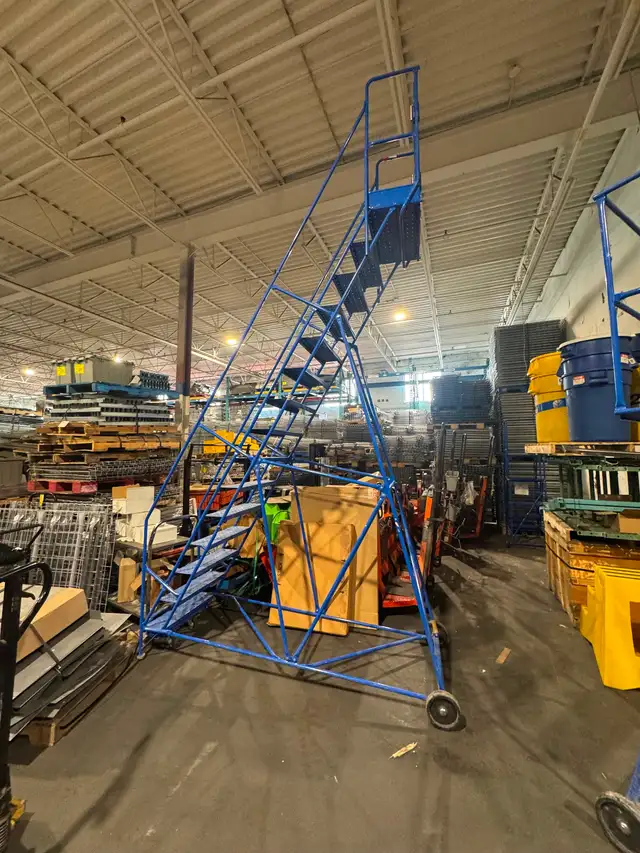 Used 15 step rolling ladder for warehouse